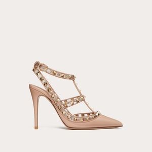 Valentino Garavani Rockstud pumps with straps in transparent Patent Leather